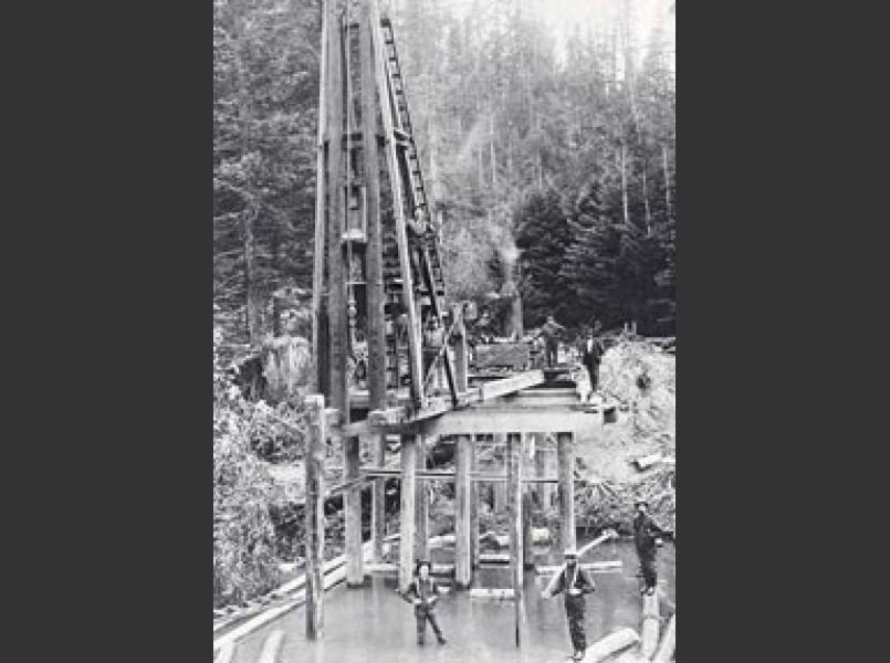 Building a railroad bridge over the south fork Gualala River.	