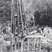 Building a railroad bridge over the south fork Gualala River.	