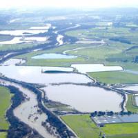 Industrial gravel pits are 80 ft. deep and hold groundwater. They are permanent scars on the landscape and have been breached by river floods many times.