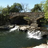 Zinfandel Lane bridge shows the effect of river channel entrenchment. The bridge piers show the original position of the riverbed.